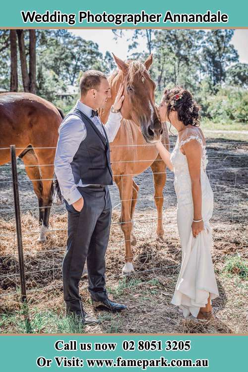 Photo of the Groom and the Bride caressing a horse Annandale NSW 2038