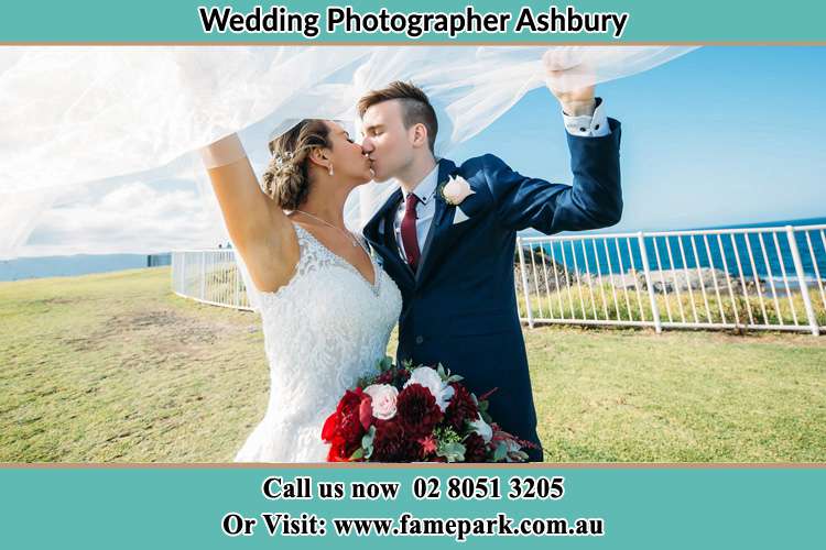 Photo of the Bride and the Groom kissing at the yard Ashbury NSW 2193