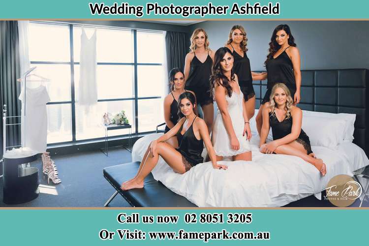 Photo of the Bride and the bridesmaids wearing lingerie on bed Ashfield NSW 2131