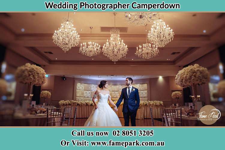 Photo of the Bride and the Groom holding hands on the dance floor Camperdown NSW 2050