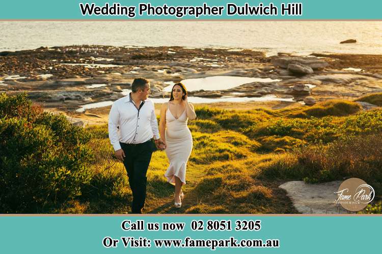 Photo of the Groom and the Bride walking near the lake Dulwich Hill NSW 2203