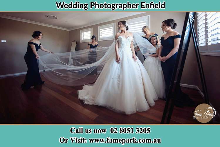 Photo of the Bride and the secondary sponsor preparing Enfield NSW 2136