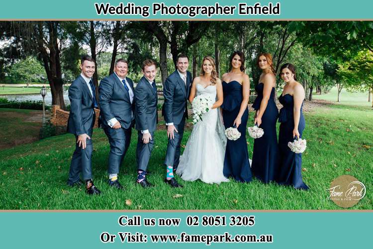 The Bride and the Groom with their entourage pose for the camera Enfield NSW 2136