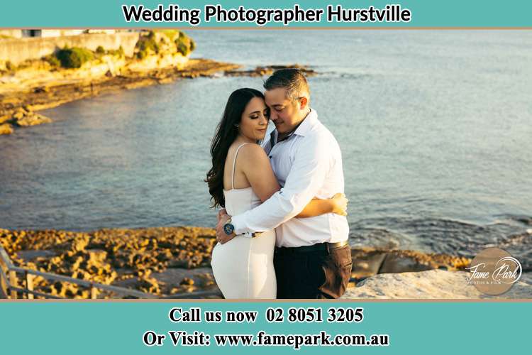 Photo of the Bride and the Groom hugging near the lake Hurstville NSW 2220