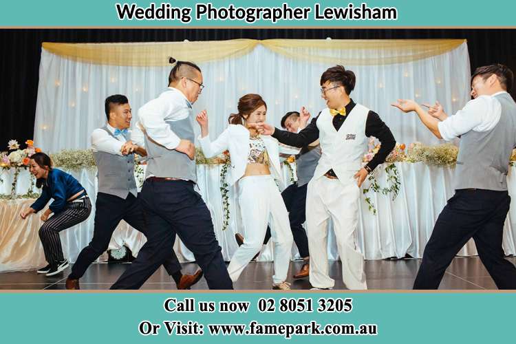 Photo of the Groom and the Bride dancing with the groomsmen on the dance floor Lewisham NSW 2049