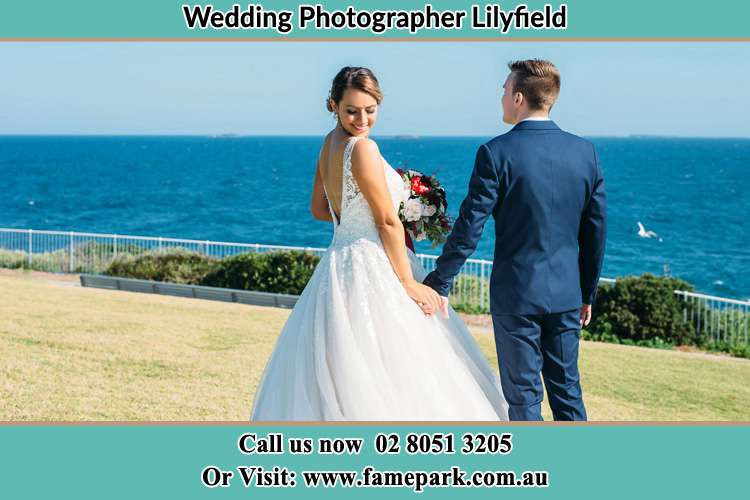 Photo of the Bride and the Groom holding hand at the yard Lilyfield NSW 2040