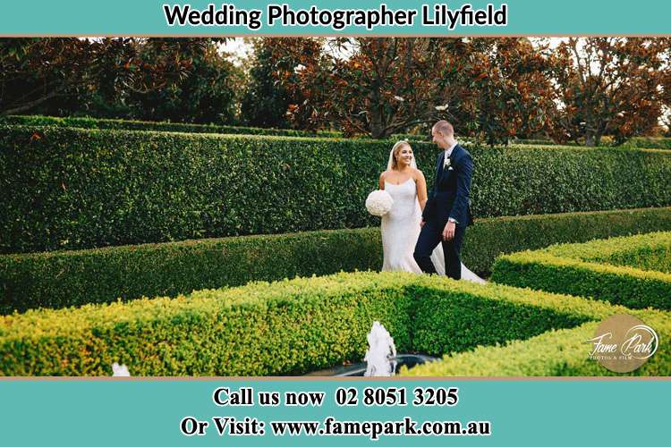 Photo of the Bride and the Groom walking at the garden Lilyfield NSW 2040