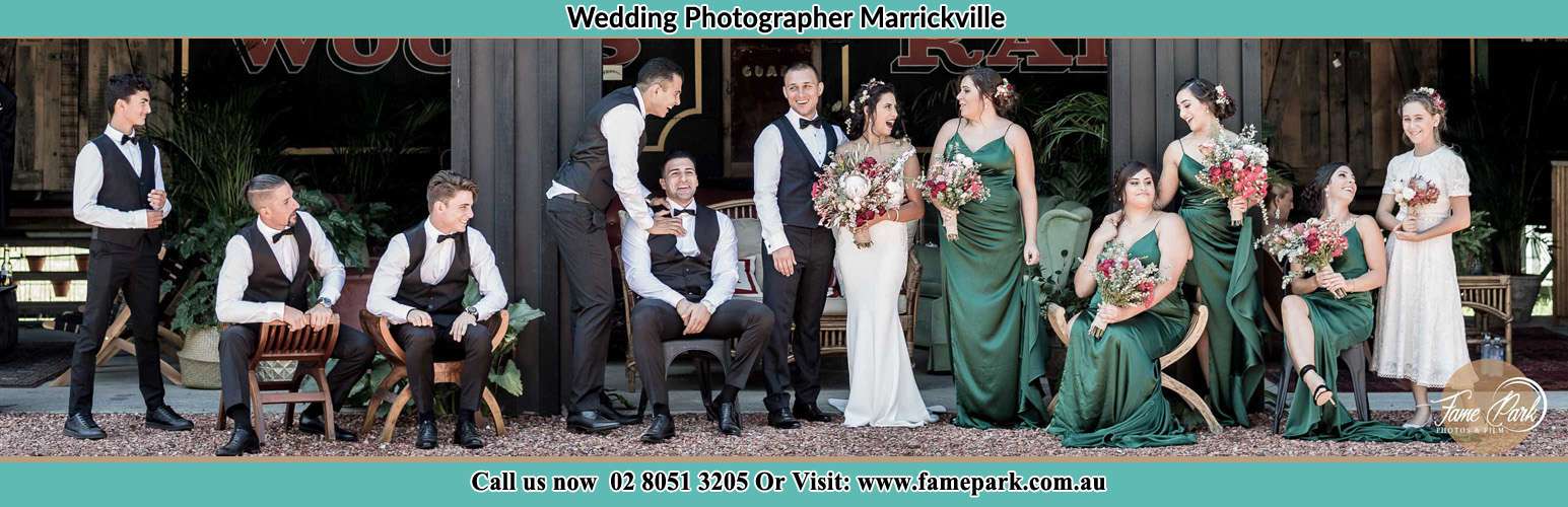 The Bride and the Groom with their entourage pose for the camera Marrickville NSW 2204