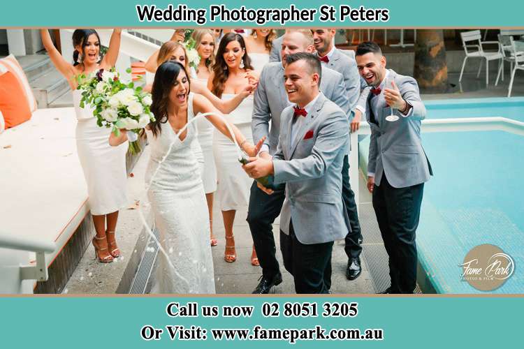 Photo of the Groom and the Bride celebrating with the secondary sponsors St Peters NSW 2044