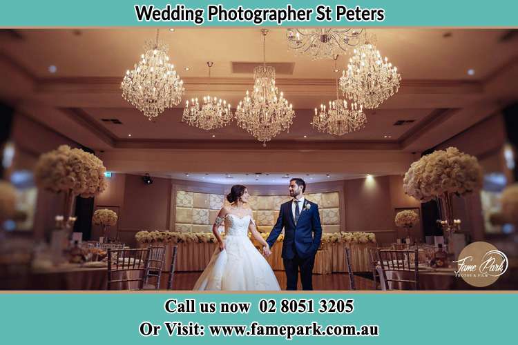 Photo of the Bride and the Groom holding hands on the dance floor St Peters NSW 2044