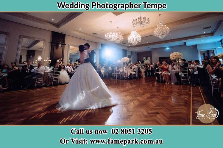 Photo of the Bride and the Groom hugging on the dance floor Tempe NSW 2044