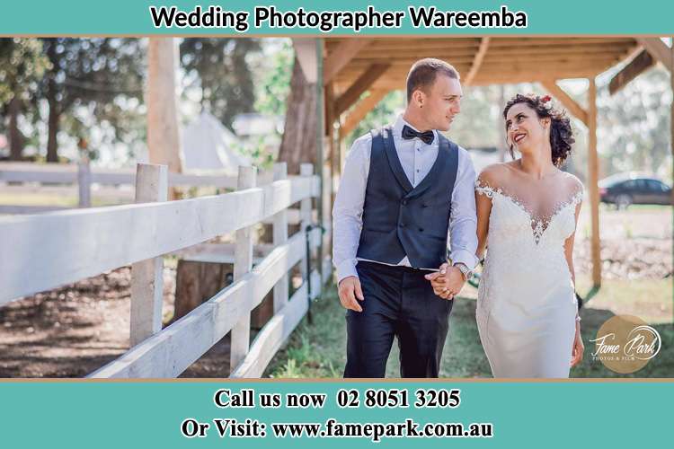 Photo of the Groom and the Bride holding hands while walking Wareemba NSW 2046