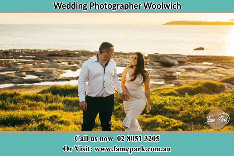 Photo of the Groom and the Bride walking near the lake Woolwich NSW 2110